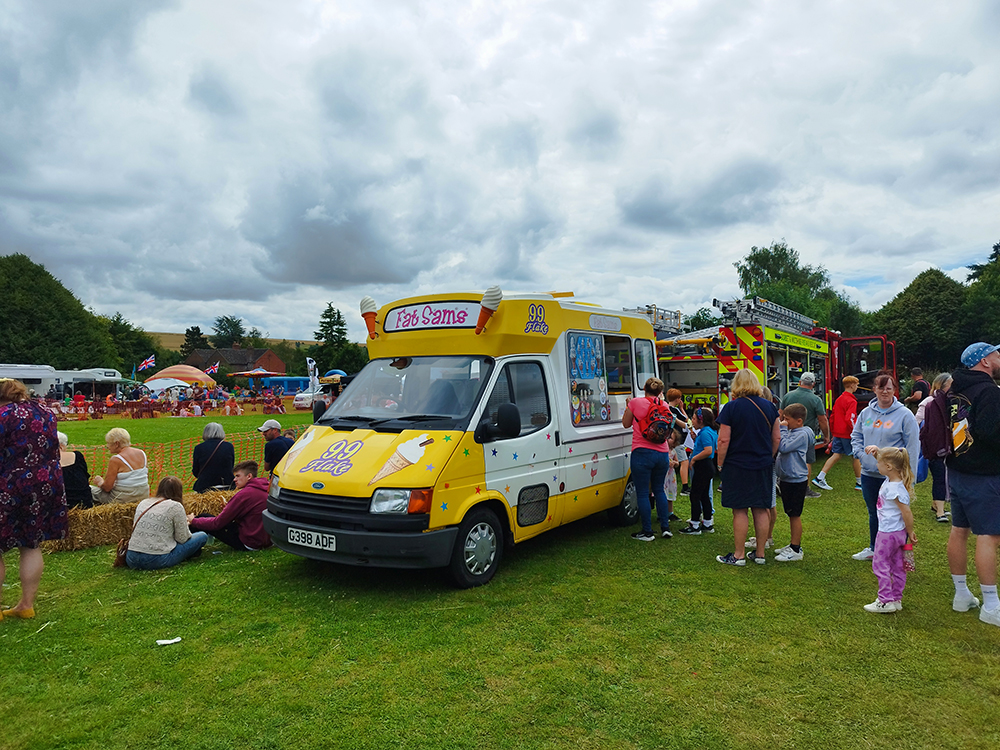 Fat Sam's Ice cream van serving ice cream at a vintage vehicle rally in Wiltshire in July 2024