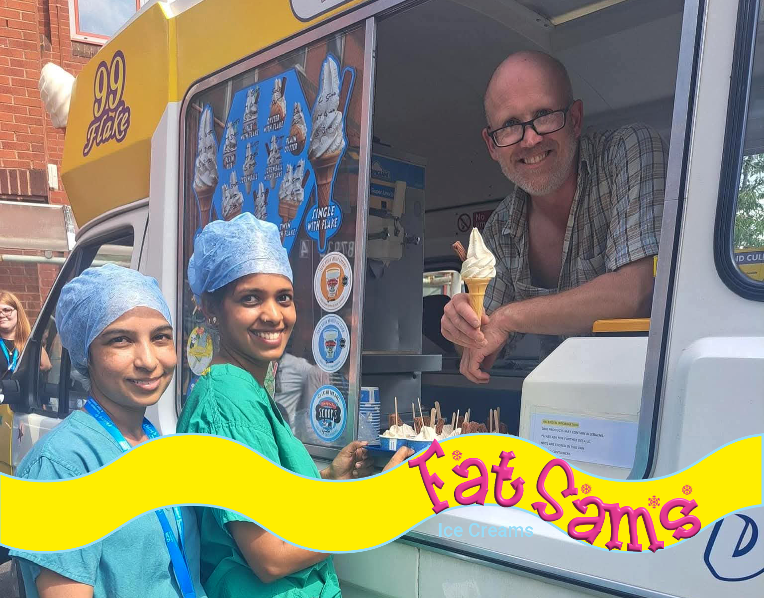 Two smiling NHS healthcare workers in green scrubs and blue hairnets stand outside Fat Sam’s yellow and white ice cream van, holding a tray of mini ice creams. Inside the van, a cheerful man leans out of the serving hatch with a cone in hand. The image captures a moment of appreciation and joy, likely during a workplace treat or celebration.